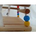 Bigjigs Toys Dřevěná korálková houpačka - II. jakost