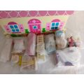 Bigjigs Toys Přenosný dřevěný domeček pro panenky - II. jakost
